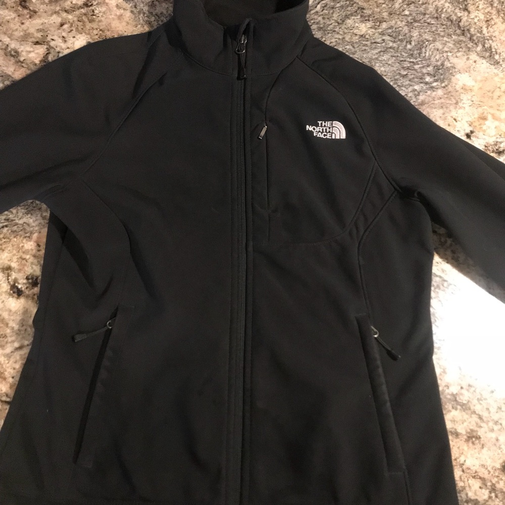 Women’s black north face jacket size small.